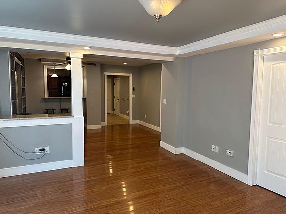 From the front door looking in, front bedroom is the door on the right