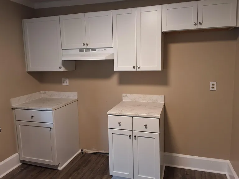 kitchen cabinets and location for stove and refrigerator