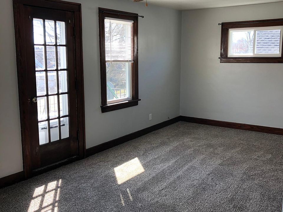 Large living room spans entire front of house
