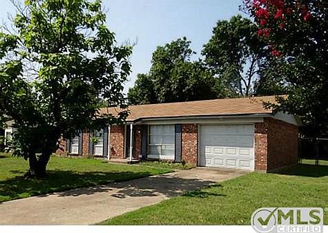 Brick home surround my mature trees single car garage