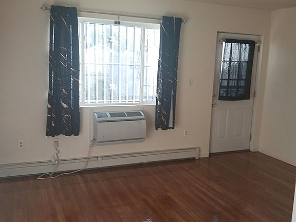2nd image of 832 E 218th St APT 1