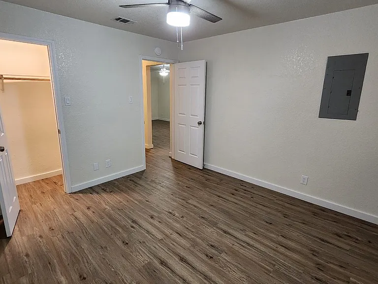 Lighted closet in back bedroom.