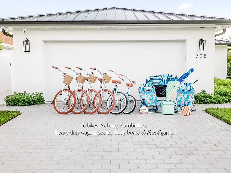 6 bikes, 6 chairs, 2 umbrellas, heavy duty beach wagon, cooler, body board, beach toys