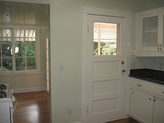 kitchen with breakfast nook overlooking garden
