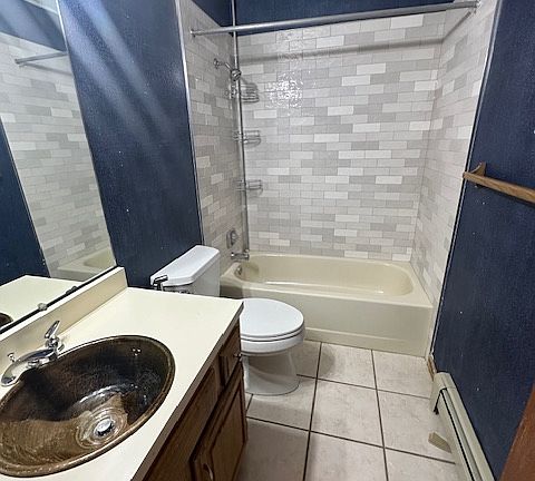 Bathroom with new Spanish tile, ceramic sink