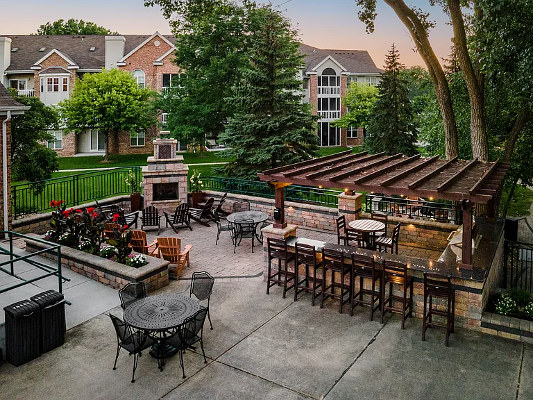 Poolside fireplace and grilling area