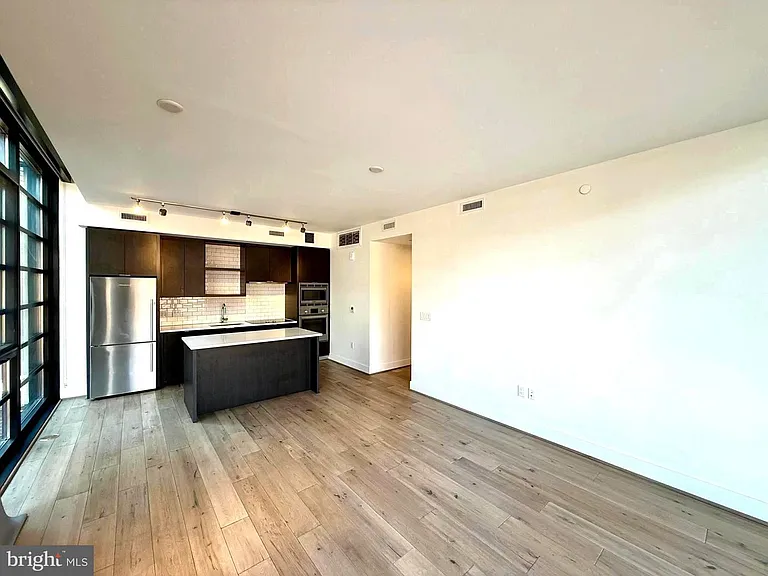 Living room with open plan kitchen