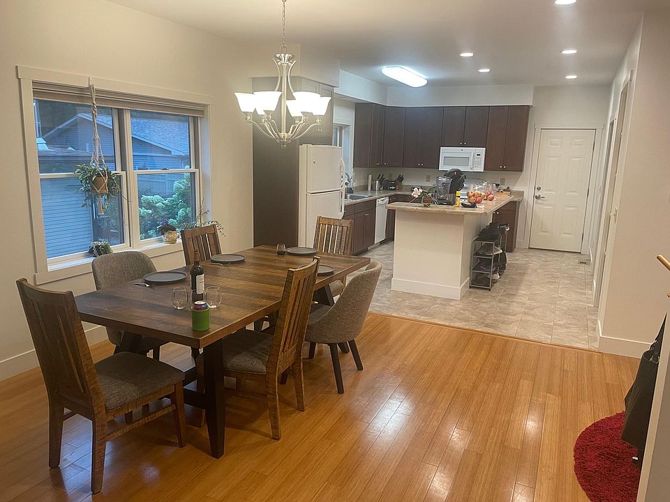 View from front entry; dining room and kitchen