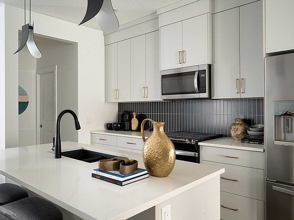 A photo of the kitchen in the Oak show home in Calgary by Brookfield Residential