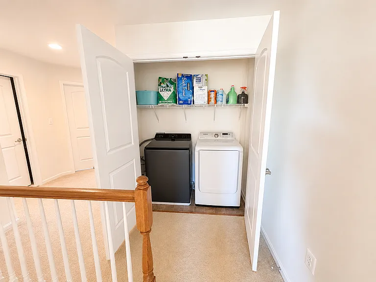 Laundry Area with Washer (new), Dryer & Storage Shelving