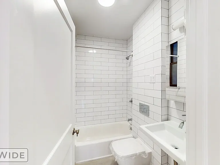 443 W 51st St #1R — Photo 7
