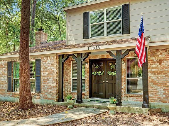Double door entry to the beautiful home with porch
