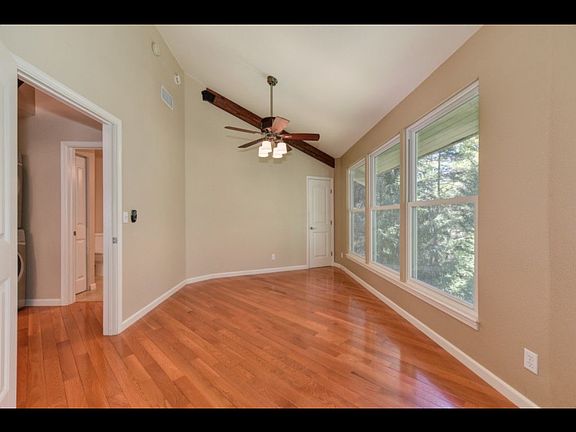 Master bed room that goes out to the living space and has it's own entrance from deck.