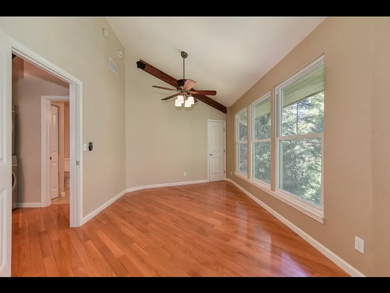 Master bed room that goes out to the living space and has it's own entrance from deck.