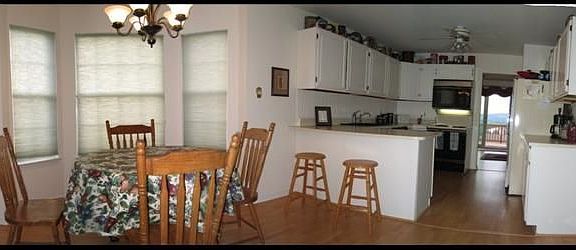 Open kitchen/breakfast nook with open dng/sitting rm to rt (not shown)  