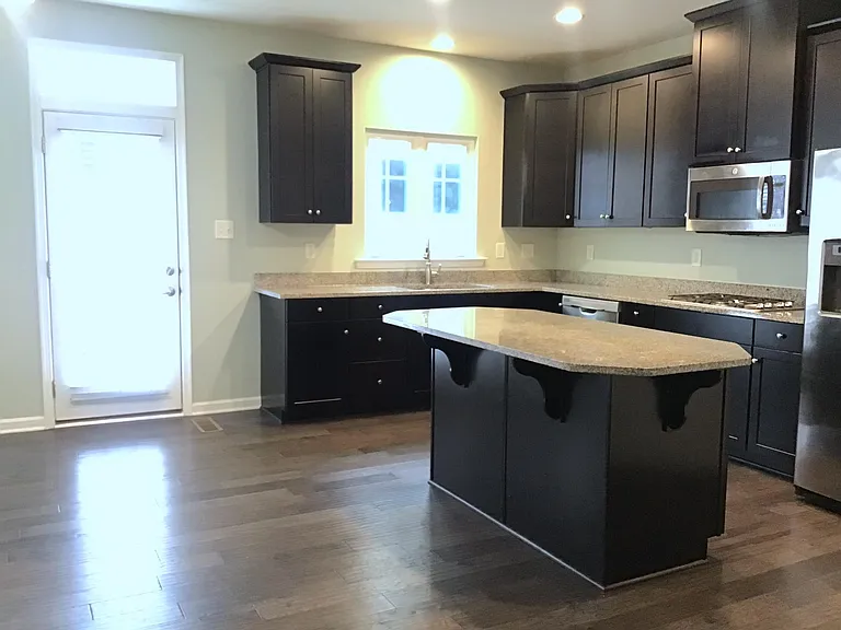 2nd floor dining & kitchen w/exit to balcony
