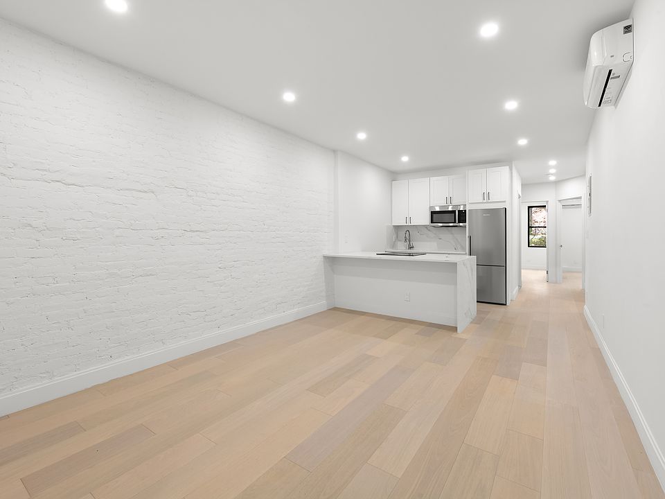 1st image of 359 W 22nd St APT 2