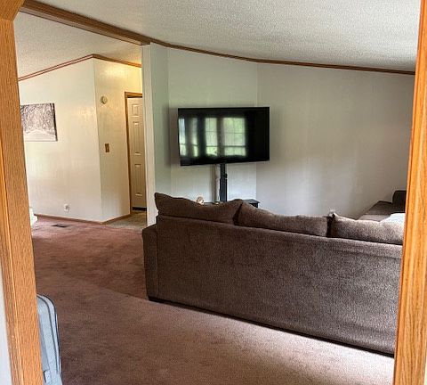 from foyer to family room, dining room to the left