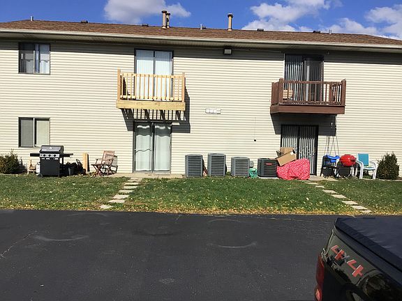 Parking Lot. 2 spots included in rent. Apt. A enters from ground floor (bottom right unit/door shown here)