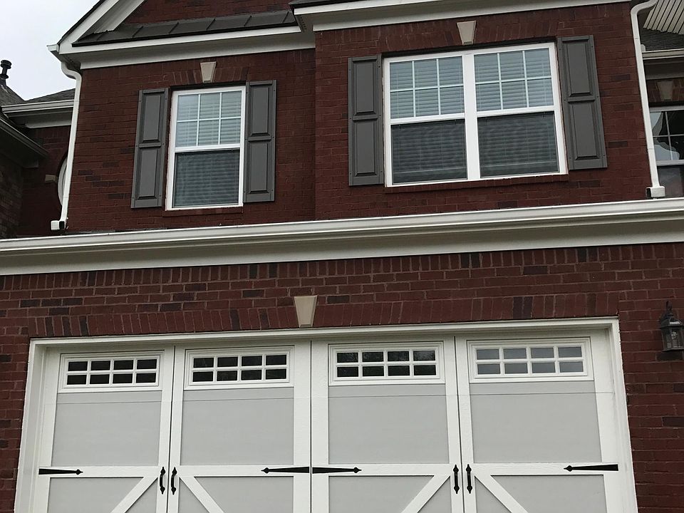 Front of Townhouse. Spacious 2 car garage and spacious driveway