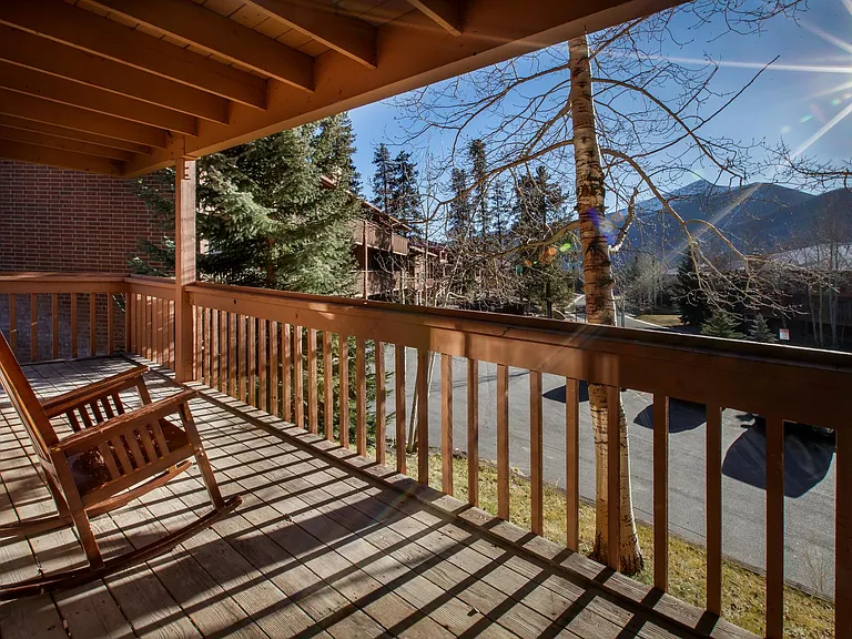 Wrap around porch by living room and kitchen
