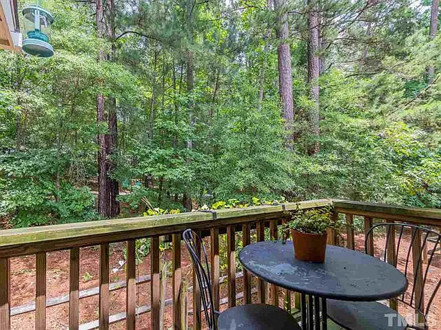 Deck facing Pritchard Park and paved pathway to Chapel Hill Library.