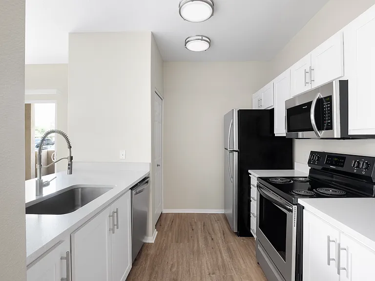 Cook, dine, and gather in a stylish kitchen space.