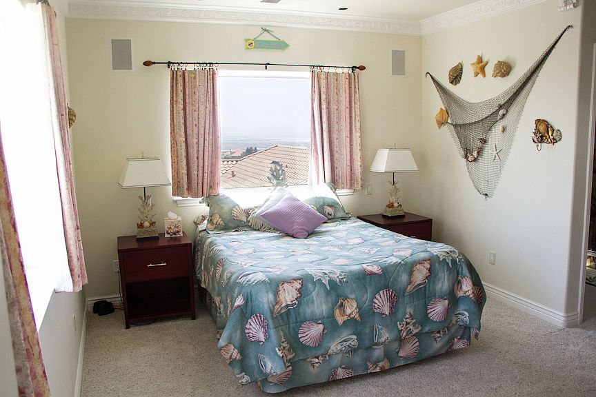 Corner bedroom, good size, SF bay views. Deck outside on left with views.