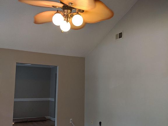 Living area looking into dining room