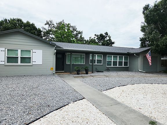 Covered Front Porch, New Roof and updated windows.