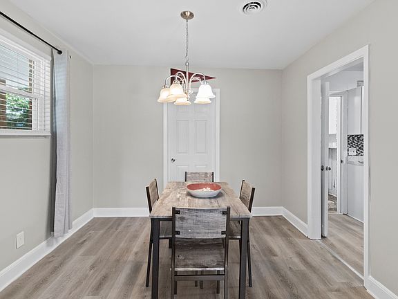 A spacious and well-lit dining area perfect for daily meals and gatherings.