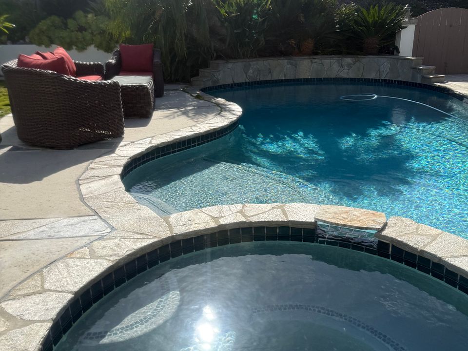 Pool, spa, waterfall, sitting area & planters