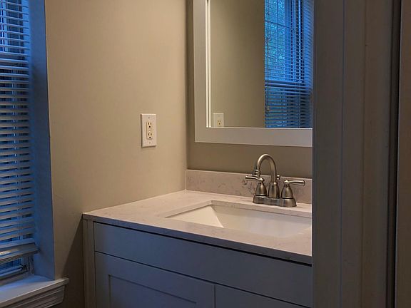 Half bathroom in entry hallway