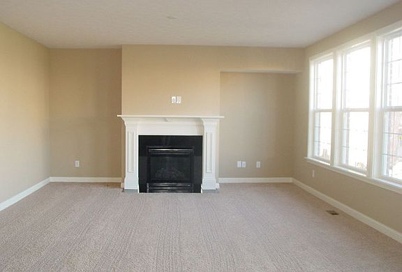 The New Haven B Family Room with fireplace
