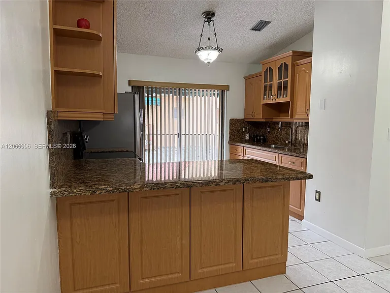 7792 W 29th Way #202 — Photo 3