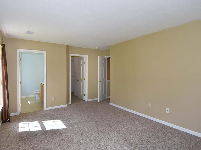 The master bedroom has a large attached master bath and a walking closet