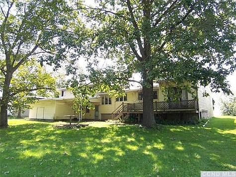 deep tree-shaded back yard; lot is .61 acre, 200' deep and 155' wide.