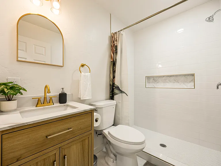 Full bathroom stocked with essential amenities, fresh towels, and a convenient layout designed for comfort and ease during your stay.