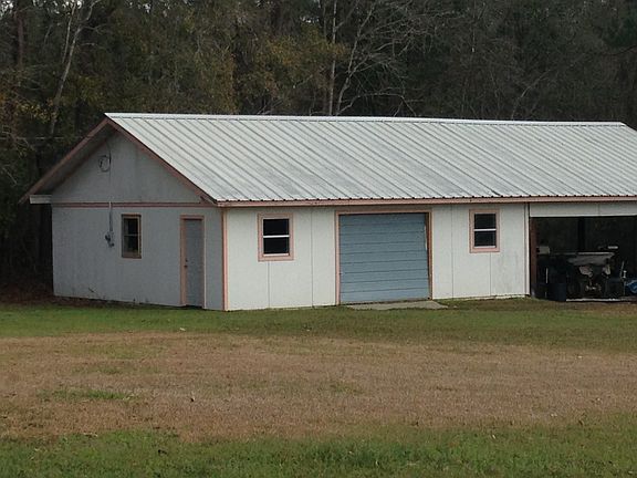 30x30 enclosed shop with 50'overhang