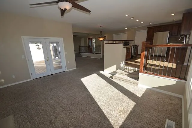 fireplace room looking toward dining and living rooms