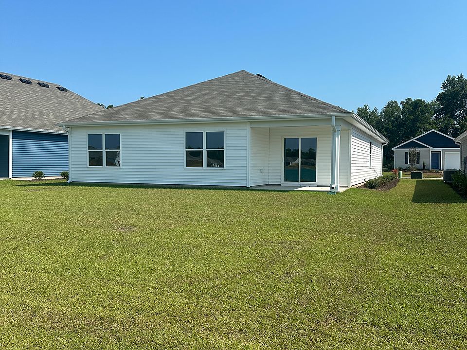 View of rear of house showing the covered porch.