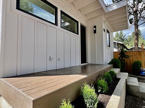 Front of house with porch.