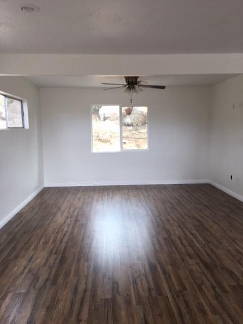 Living room, beautiful boulder hardscape out the windows