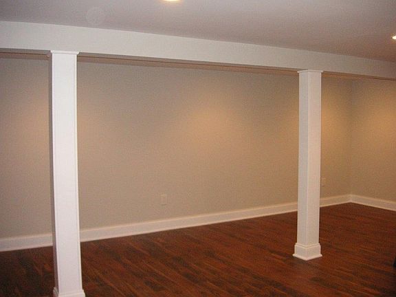 Basement : Recessed Lighting , Decorative Molding, and Laminate Flooring