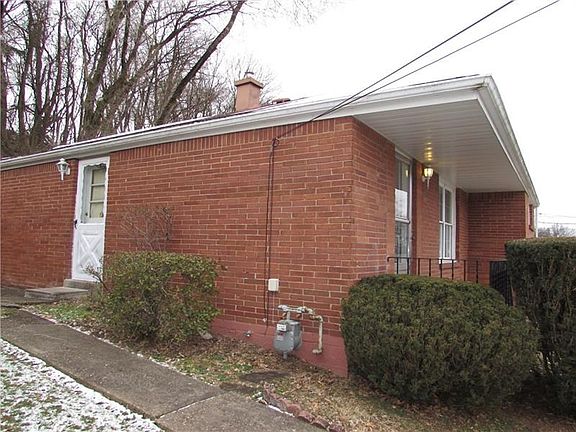 Updates Include a 150 Amp Electric Panel Box, Newer Furnace & Central AC, a New Garage Door and Extra Insulation.