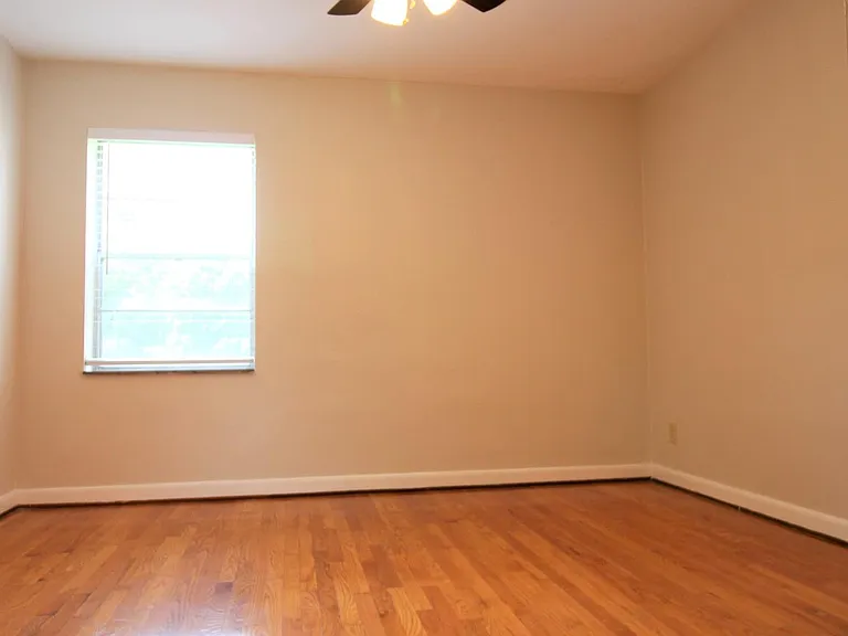 Bedroom with lots of room for a queen / king bed
