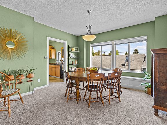 Dining room. Table seats 4 - 8, with use of table leaves (included)