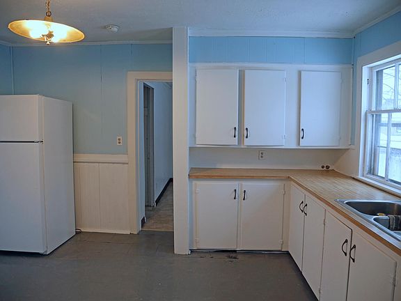 Kitchen with plenty of cabinets and counter space.