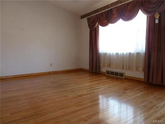 The big picture window allows the sunlight to flood in.