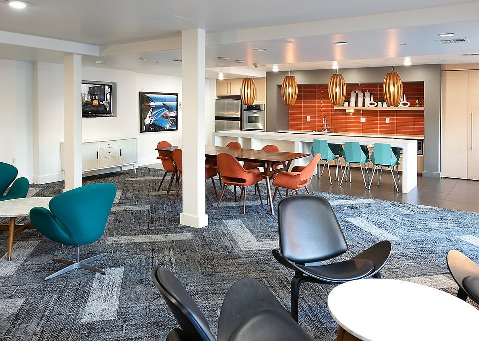 Resident Lounge with full kitchen, large dining table and chairs.
